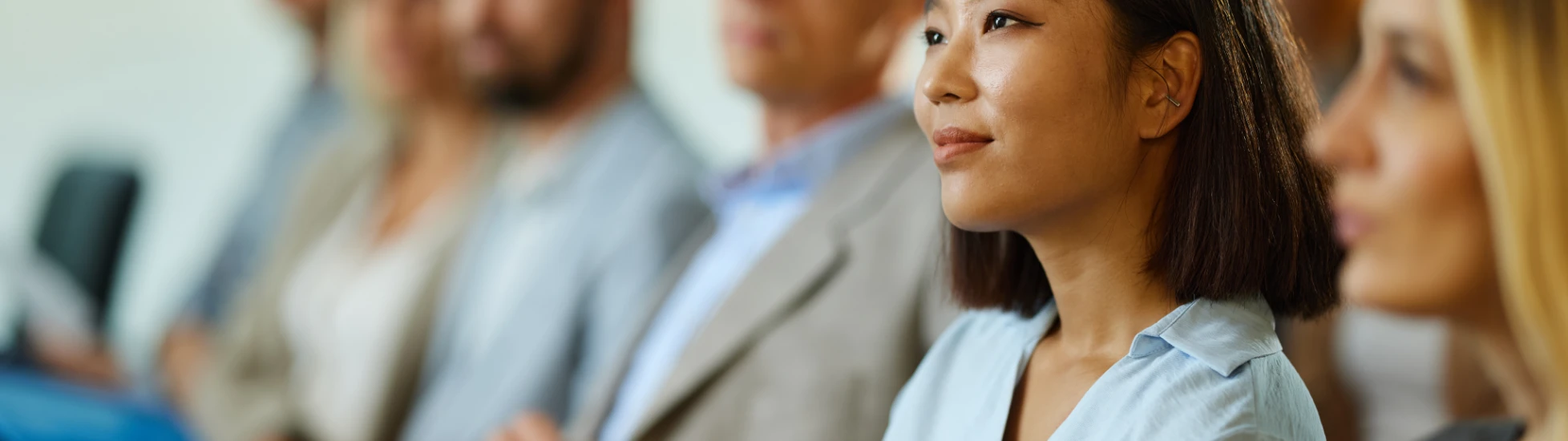 woman in group listening attentively