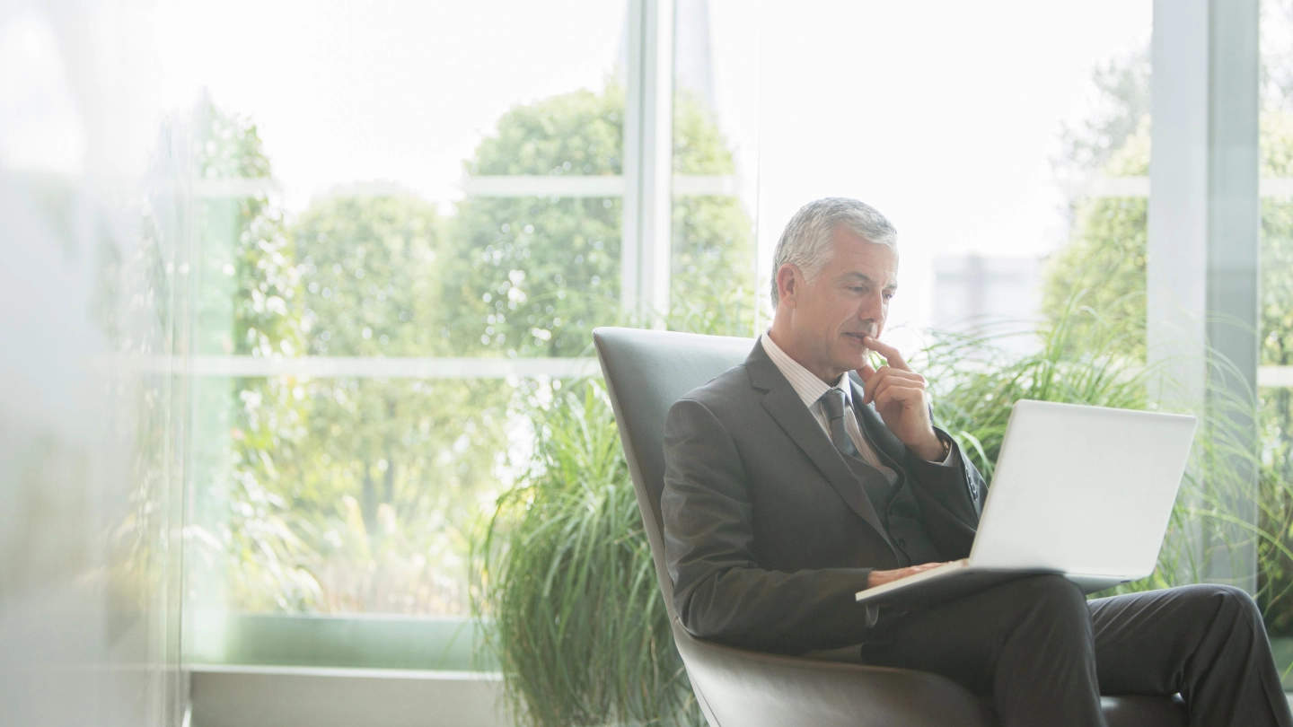 man_in_green_office_fullcolor_3c_hr image